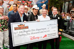 Director, John Lasseter; singer Brad Paisley; Vice President Brand Marketing, Fireman's Fund Insurance Company, Paul Fuegner; and Los Angeles Assistant Fire Chief Matthews present a check for $25,000 to the Los Angeles Fire Department as part of Fireman’s Fund’s Heritage Program, supporting firefighters for safer communities at the Disney premiere of Planes: Fire & Rescue Tuesday, July 15 at the El Capitan Theater in Hollywood. Director, John Lasseter; singer Brad Paisley; Vice President Brand Marketing, Fireman's Fund Insurance Company, Paul Fuegner; and Los Angeles Assistant Fire Chief Matthews present a check for $25,000 to the Los Angeles Fire Department as part of Fireman’s Fund’s Heritage Program, supporting firefighters for safer communities at the Disney premiere of Planes: Fire & Rescue Tuesday, July 15 at the El Capitan Theater in Hollywood.