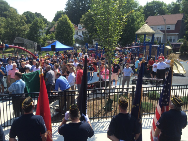 Dozens gathered as the West Roxbury as the playground was dedicated to Boston fire Lt. Edward J. Walsh Jr. and Michael R. Kennedy.