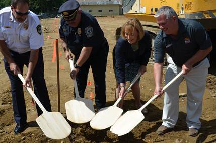 Rustic Crust and American Flatbread frozen pizza CEO Brad Sterl (right) was joined by New Hampshire Governor Maggie Hassan (second from right), New Hampshire Police, Fire & EMS Foundation Founder and President Jim Valiquet (second from left) and Pittsfield, NH Fire Chief Robert Martin (left).