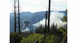 Smoke rises from a plane that crashed Tuesday. Smoke rises from a plane that crashed Tuesday.