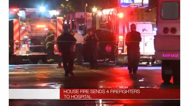 Officials gather at the scene on Blue Hills Avenue in Hartford Tuesday night.