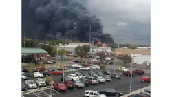 A blaze at a Lima warehouse sends black smoke downtown. A blaze at a Lima warehouse sends black smoke downtown.
