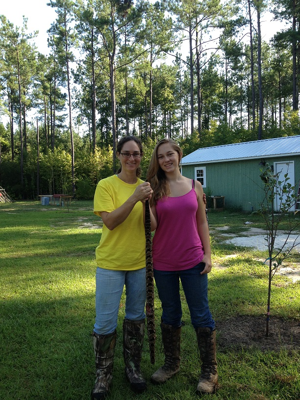 Cynthia Mills and her daughter after finding the Timber Rattler.