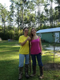 Cynthia Mills and her daughter after finding the Timber Rattler. Cynthia Mills and her daughter after finding the Timber Rattler.
