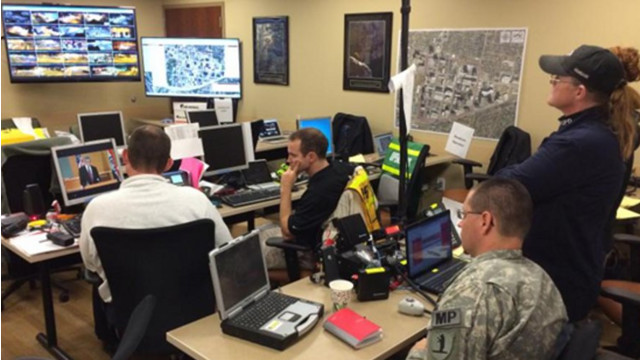 Several groups staffed the emergency operations center for the grand jury decision.