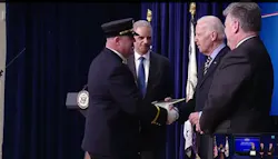 Former Bellmore Fire Chief John Curley is congratulated by Vice President Joe Biden during a White House ceremony. Former Bellmore Fire Chief John Curley is congratulated by Vice President Joe Biden during a White House ceremony.