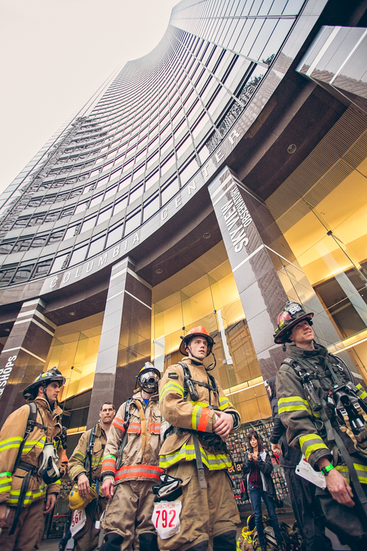 Firefighters line up to climb 1,311 steps of Seattle's Columbia Center Tower.