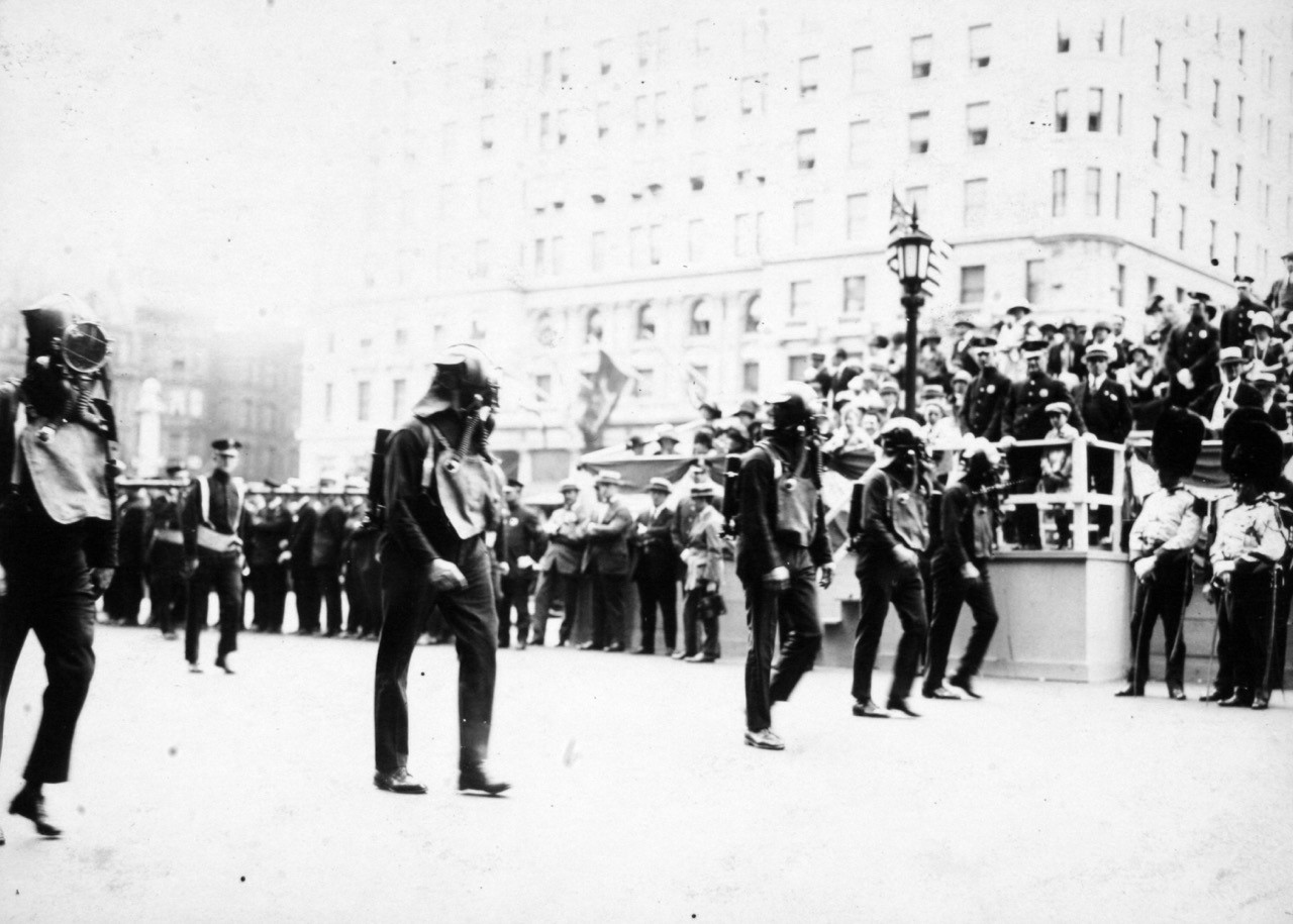 Members of Rescue Company 1 wearing smoke helmets during the FDNY 50th Anniversary parade and Medal Day presentation, June 12, 1915.