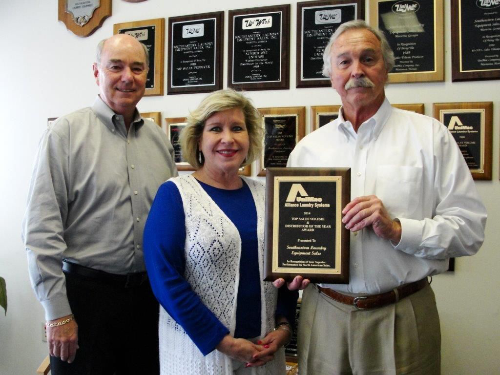 The award recipients from Southeastern Laundry Equipment Sales, are from left to right: Joe Cole, sales manager; Cindy Richie, vice president/general manager; and Trebor Brown, president.