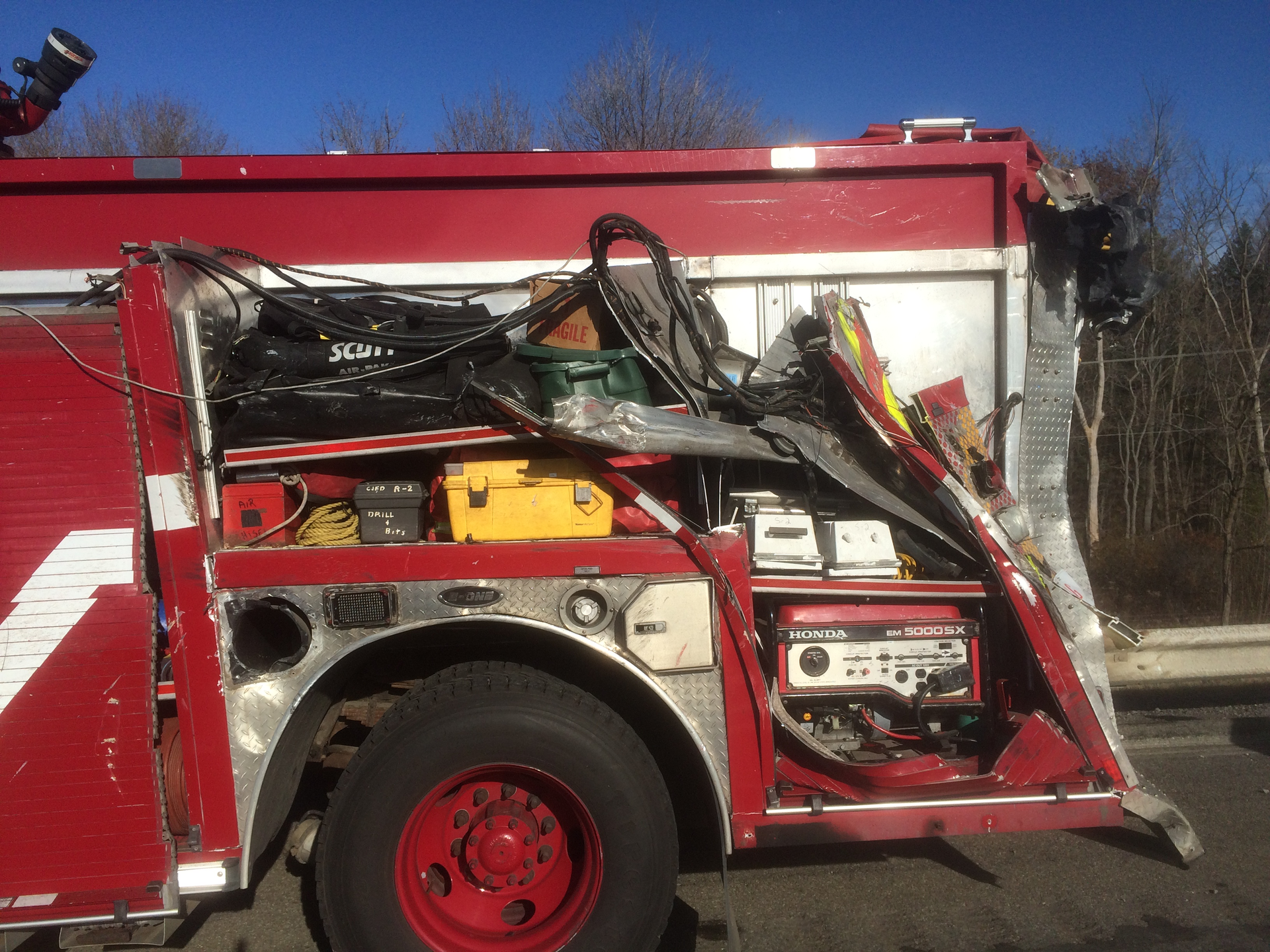 A car hauler struck the truck, which had been responding to an incident on the Ohio Turnpike.