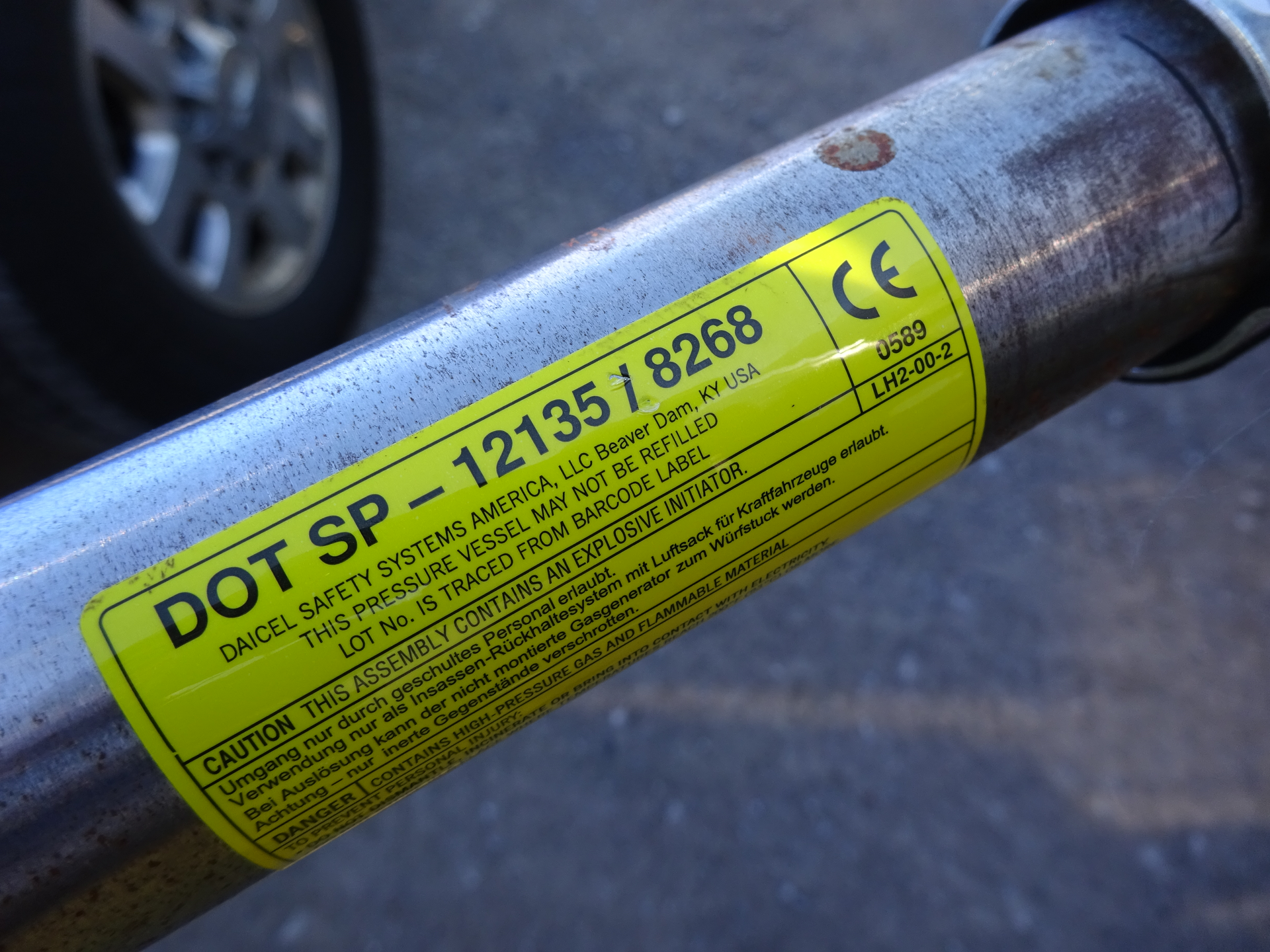 This stored gas inflator for the roof airbag unit of an SUV is pressurized to 8,268 psi and contains argon and helium gas. There is no relief valve or &ldquo;blow-out&rdquo; port on these sealed inflator units. They can easily overheat during a fire and become exploding or flying objects.