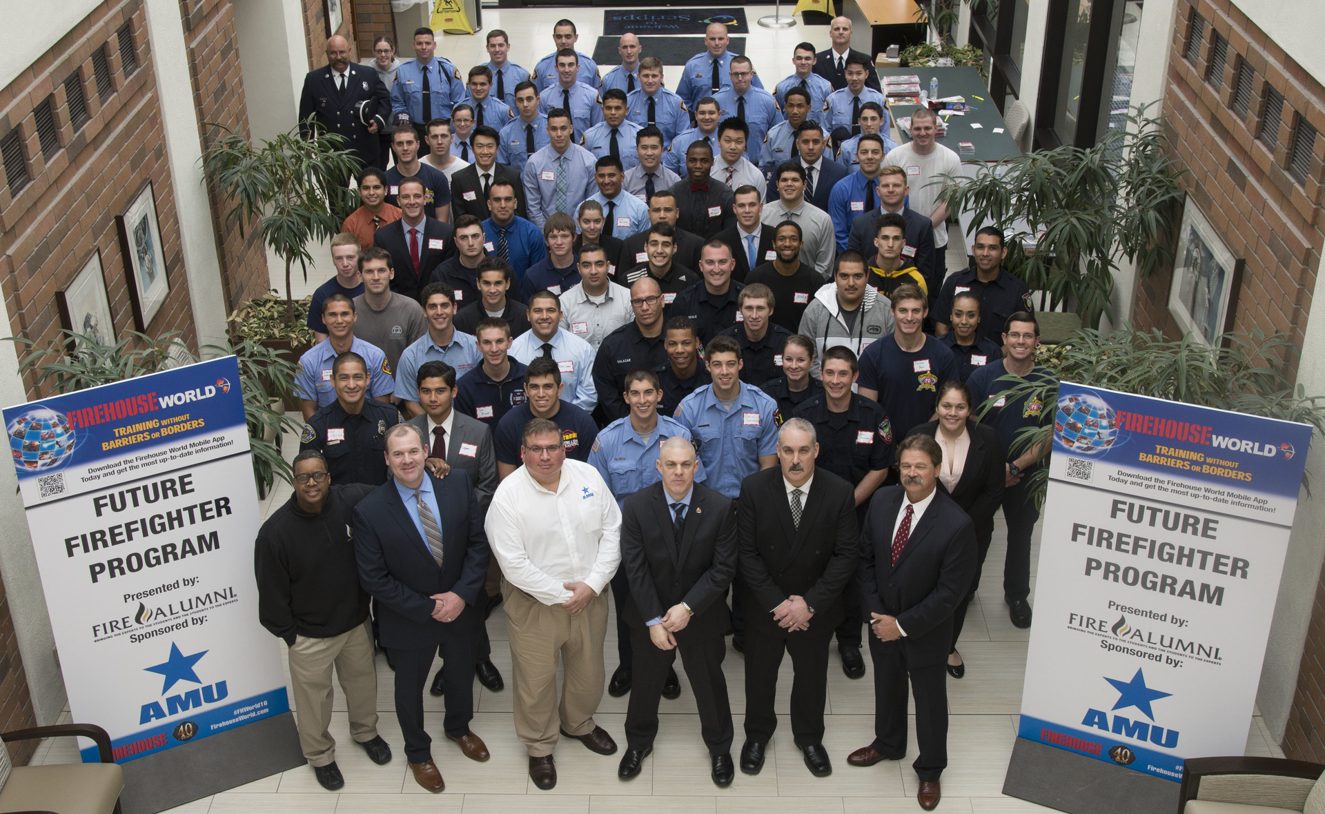 Staff and students from Sunday's Firehouse Future Firefighter Experience posed for a group photo.
