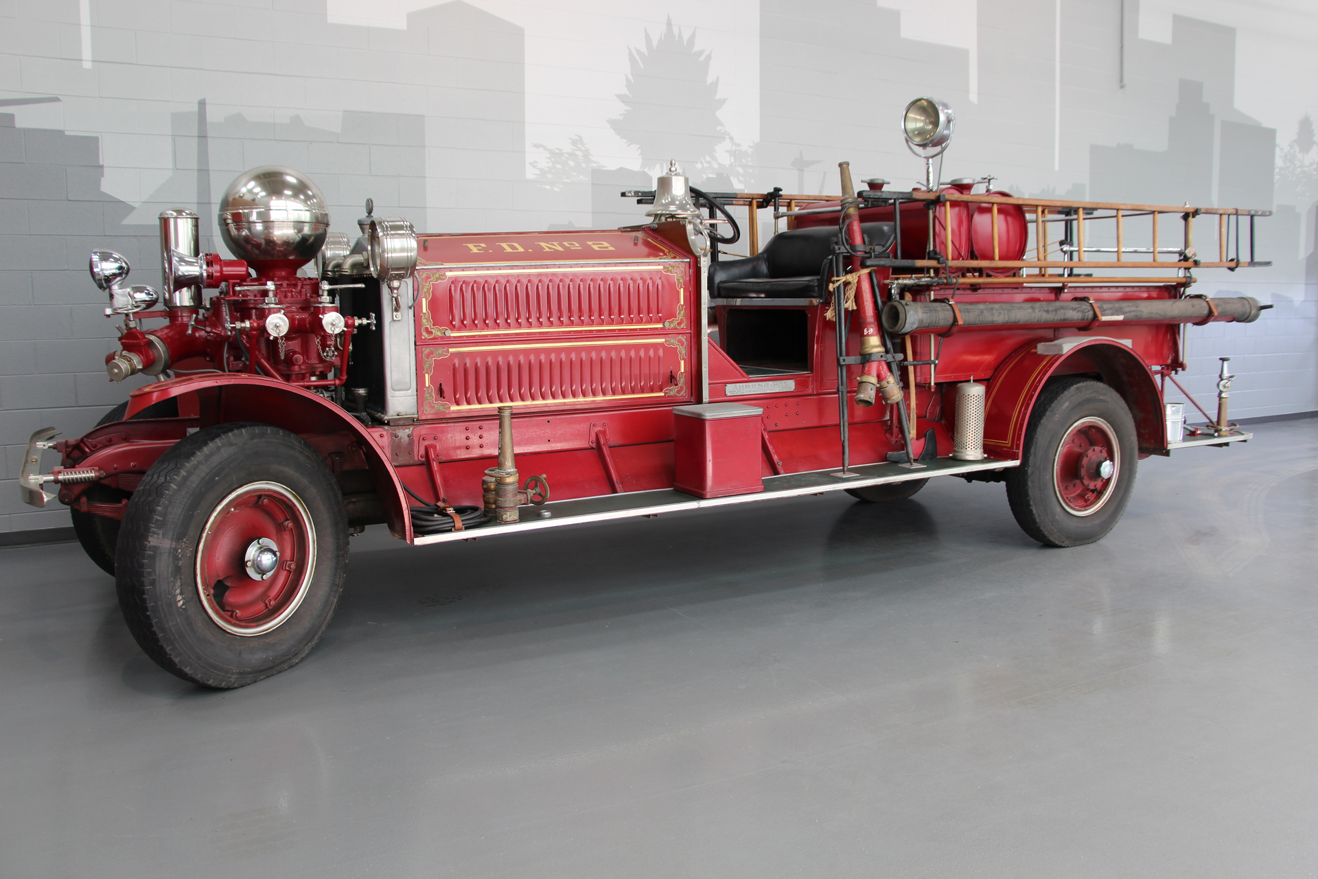 A 1926 Ahrens Fox apparatus is showcased in HME's corporate office.