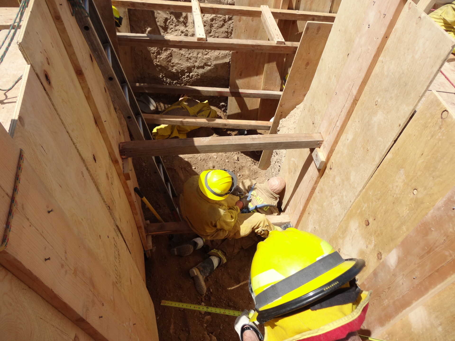 Three-fourth-inch panel with 2 x 12 uprights and 4 x 4 struts during training exercise.