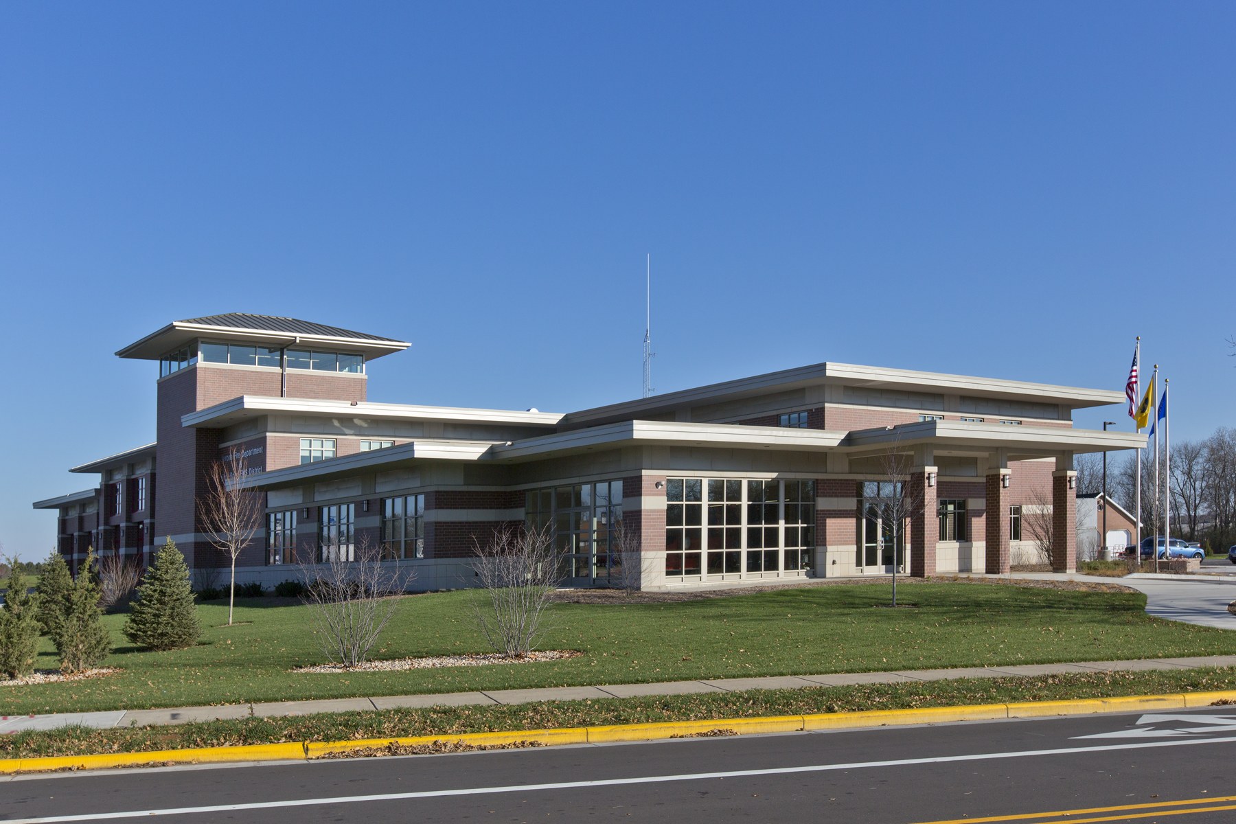 A station site must be located on, or adjacent to, a main travel artery that provides good access, egress, visibility for responding fire department emergency apparatus, and adequate public alerting of the fire department incoming and departing fire equipment.