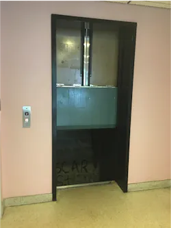 Figure 1: An elevator is stuck at a point between the second and third floor where you may be able to have to the three people climb down and out on a ladder to the second floor or up and out to the floor above via a ladder. Figure 1: An elevator is stuck at a point between the second and third floor where you may be able to have to the three people climb down and out on a ladder to the second floor or up and out to the floor above via a ladder.