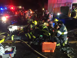 Clackamas firefighters provide efforts to resuscitate the man rescued from the Oregon City apartment building. Clackamas firefighters provide efforts to resuscitate the man rescued from the Oregon City apartment building.
