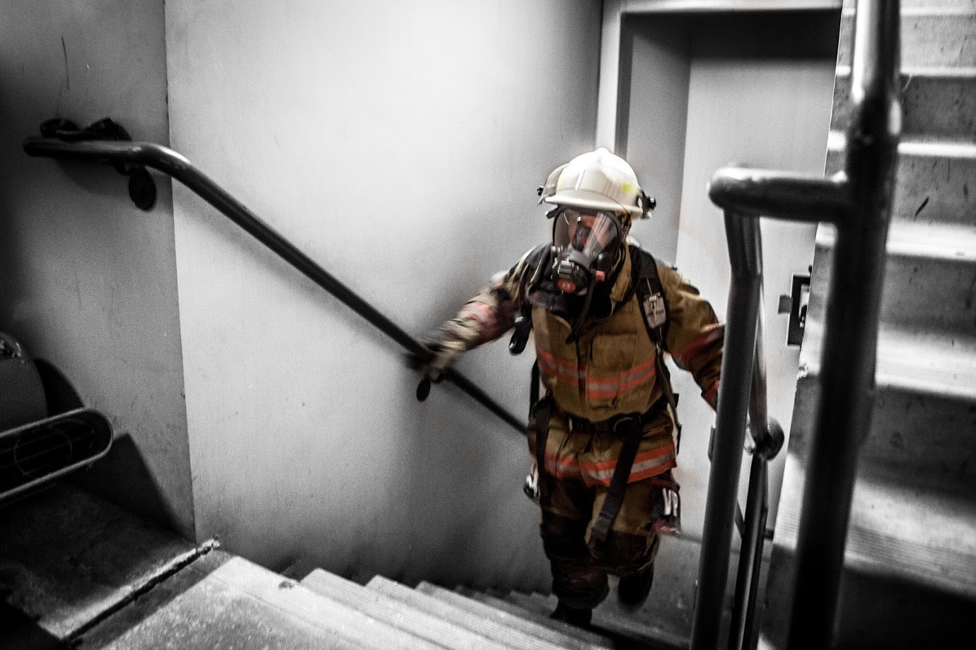 Tim Sendelbach makes his way up the stairs in the 69-story building.