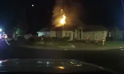 This image from a dashcam video shows firefighters setting up to tackle a house fire in Eagle Point, OR, on Monday. This image from a dashcam video shows firefighters setting up to tackle a house fire in Eagle Point, OR, on Monday.