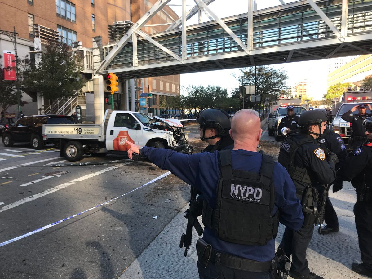 The NYPD's Counterterrorism Unit was on scene after an alleged terrorist drove the rented pickup truck seen in the background along a bike path in lower Manhattan on Tuesday, killing eight people.