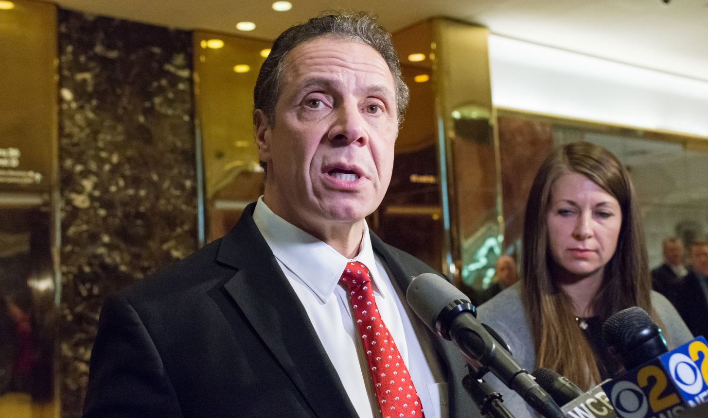 New York Gov. Andrew Cuomo speaks with reporters in the lobby of Trump Tower in New York City following a meeting with President Donald Trump on Jan. 18, 2017.
