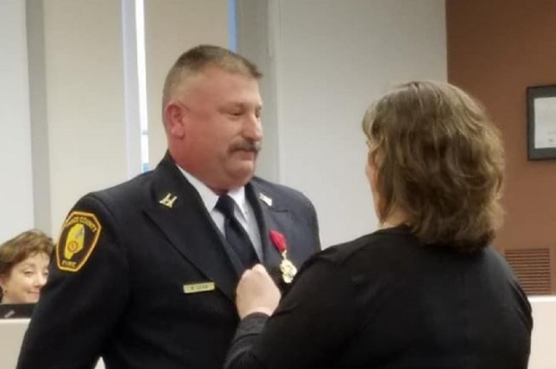 Vance County, NC, fire Capt. Mike Lejda receives his Medal of Valor on Oct. 2, 2017.