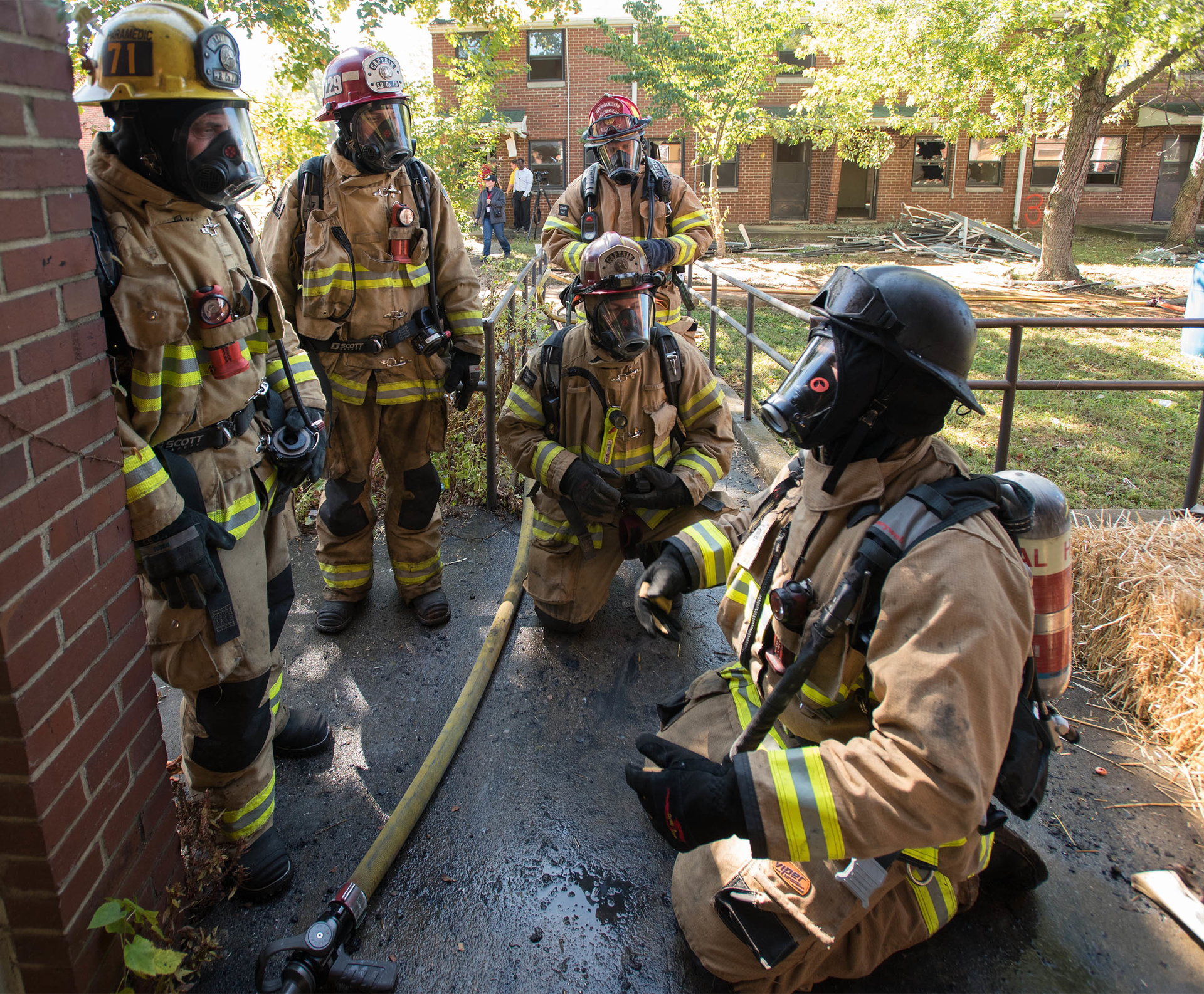 An ideal engine staffing level is an officer, chauffeur, nozzle, backup, door and control firefighters.