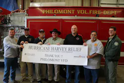 Officials from Philmont, Port Aransas and Texas A&M Forest Service pose for a photo with the donated pumper. Officials from Philmont, Port Aransas and Texas A&M Forest Service pose for a photo with the donated pumper.