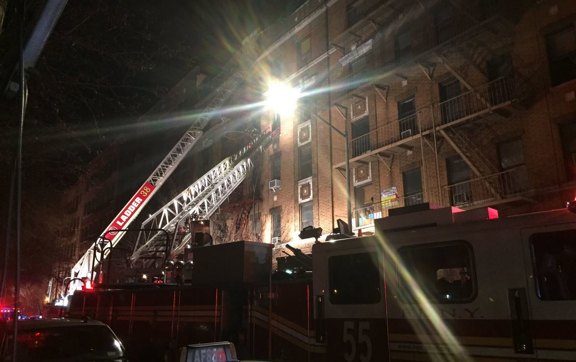 FDNY crews operate during a four-alarm fire at a Bronx apartment building that killed twelve people on Thursday night.