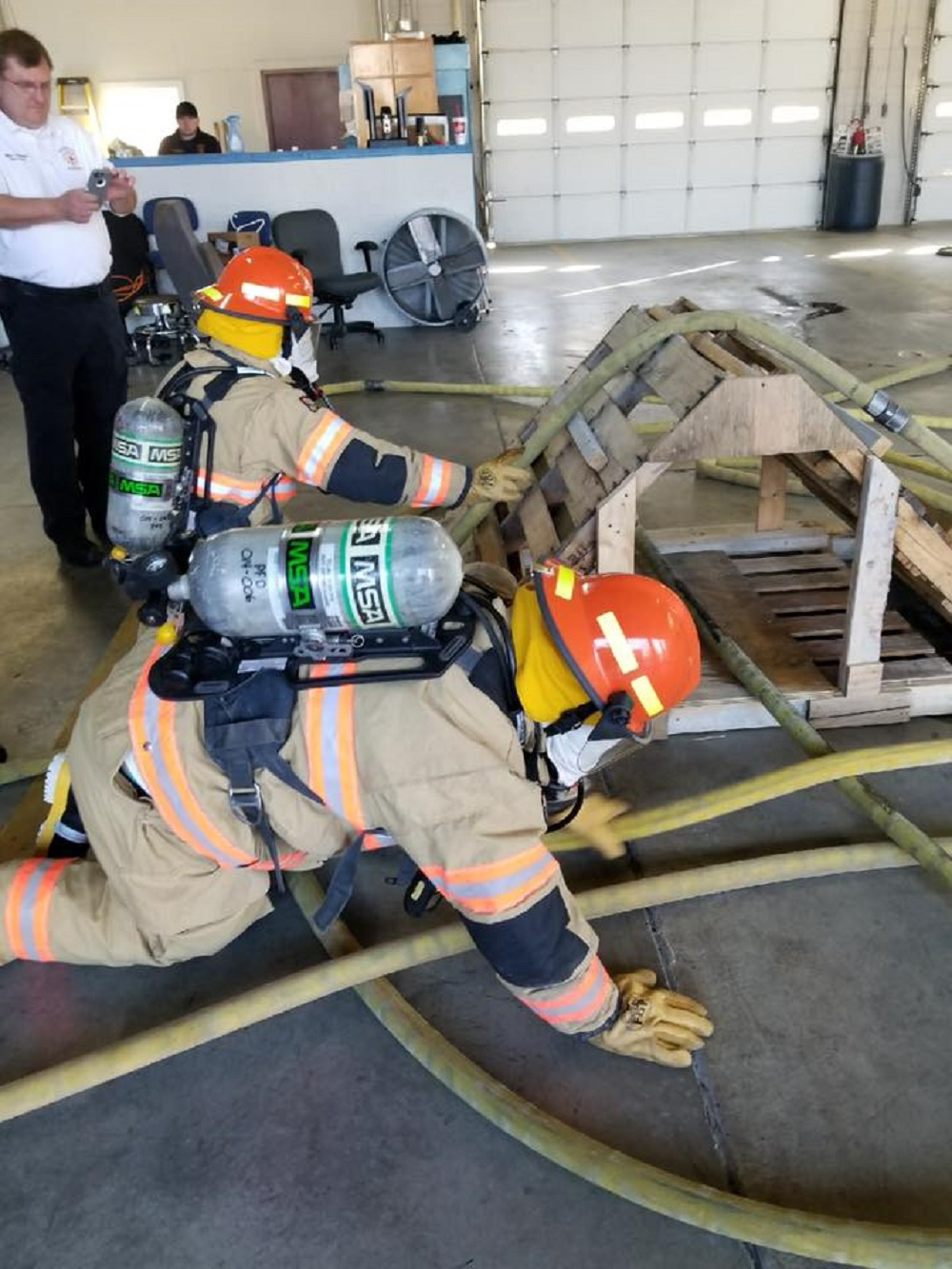 Piedmont High School students take part in a drill on Dec. 14, 2017, during a recruitment program offered by the city's fire department.