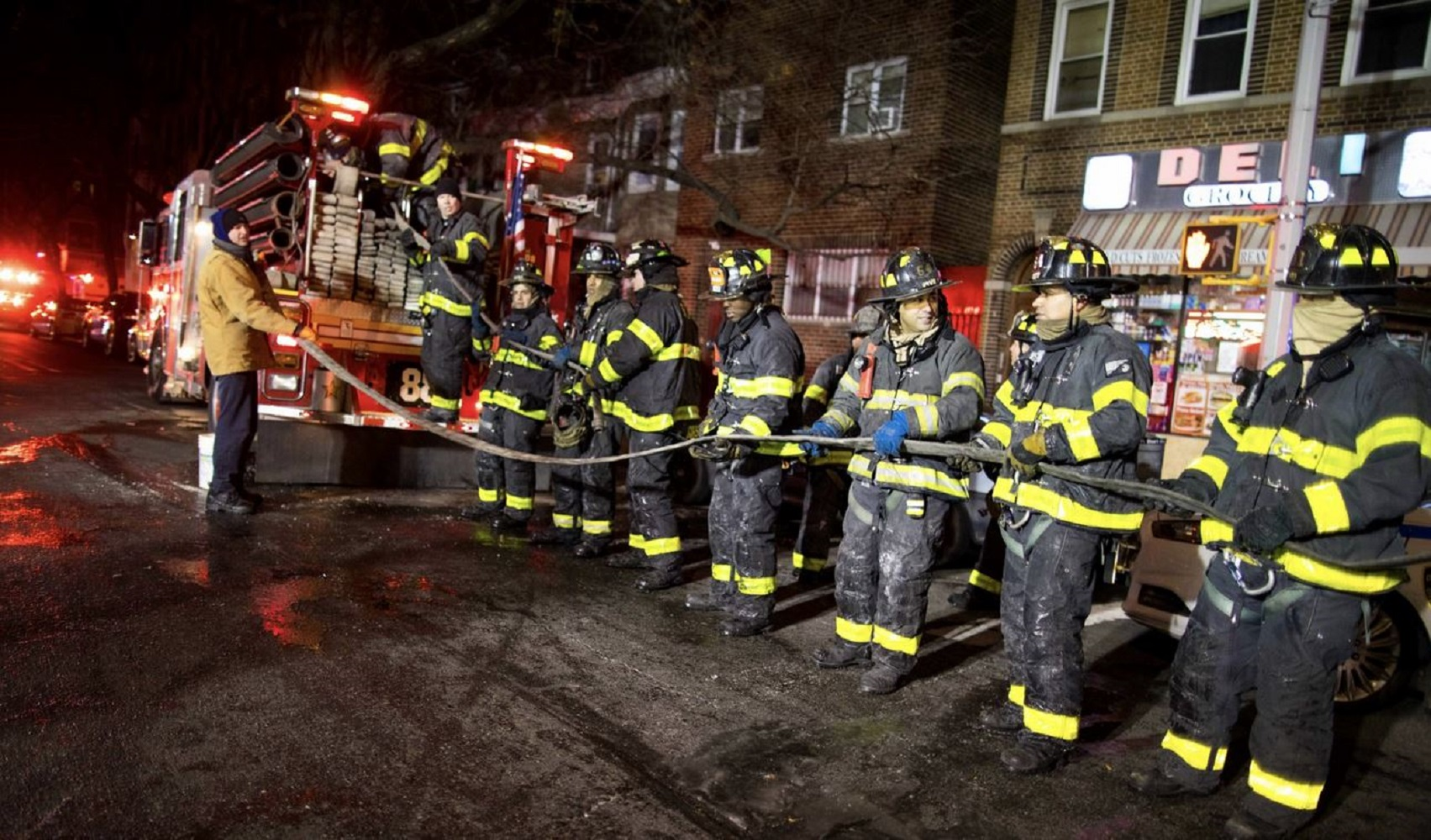 FDNY firefighters on scene at a Bronx apartment building fire Dec. 28 that has now killed 13 people after a 27-year-old man succumbed to his injuries on Thursday.