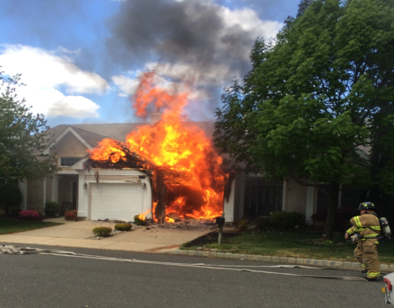 Photo 7: Officers must consider the potential heat release rate, construction type, air transfer within the compartment, and fuel loading when determining which line to deploy.