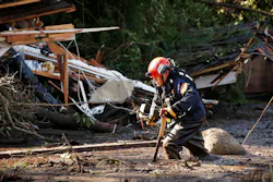 Crews from Orange County Search and Rescue work to locate victims along Olive Mill Road at Hot Springs Road in Montecito, CA, on Wednesday, Jan. 10, 2018. Crews from Orange County Search and Rescue work to locate victims along Olive Mill Road at Hot Springs Road in Montecito, CA, on Wednesday, Jan. 10, 2018.