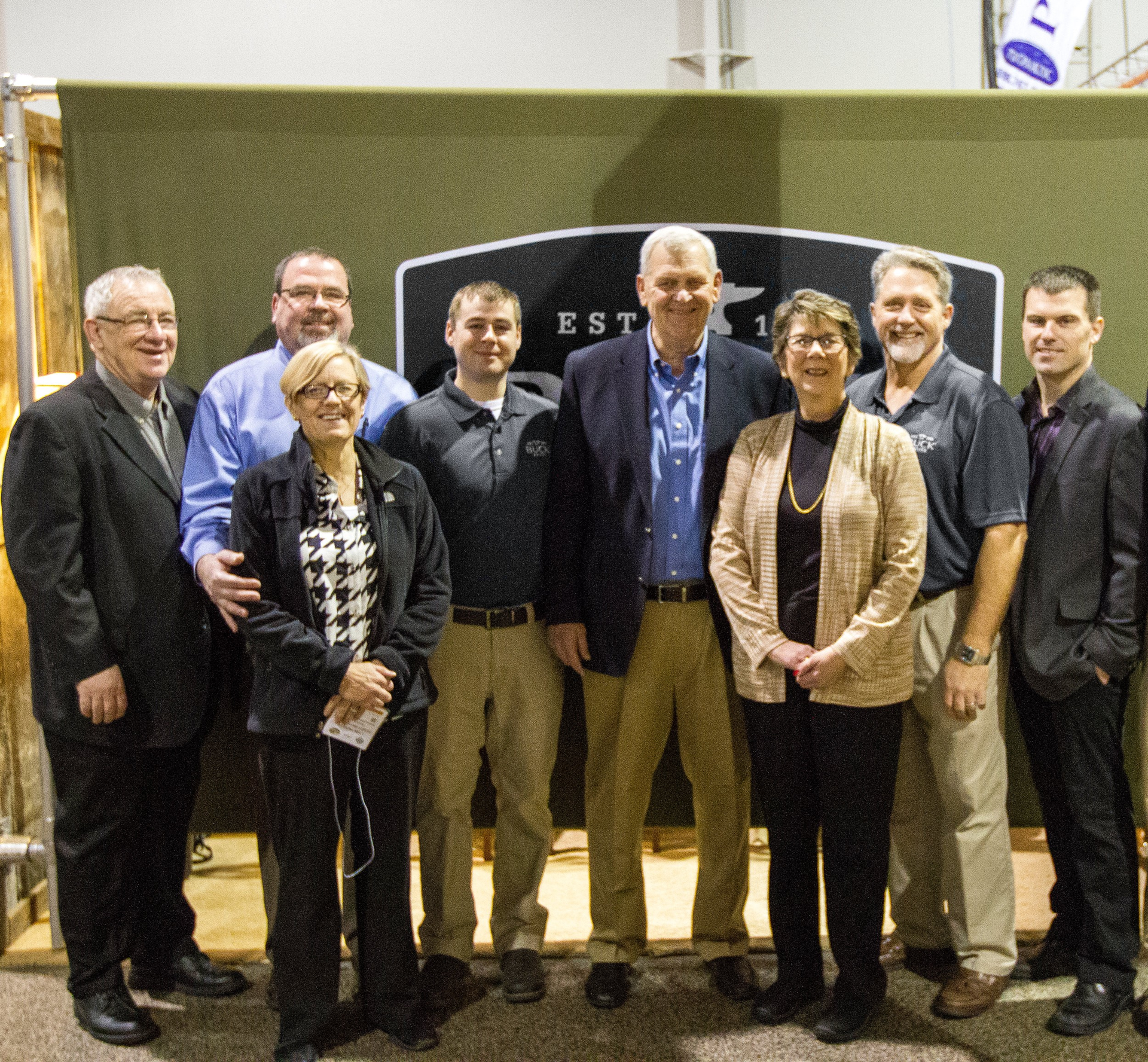 Tackett Brothers Inc,--Sales Rep. Agency of the Year: Buck employees Chris Bourassa, Director of North American Sales, and CJ Buck, CEO and Chairman award the employees of Tackett Brothers with &ldquo;Sales Agency of the Year.&rdquo; Pictured from Left to Right: Steve Baughan, Andy Tackett, Lynn Tackett, Chris Bourassa, Dick Tackett, Deb Garvick, CJ Buck, and Matt Hicks.