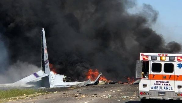Flaming pieces of a military C130 cargo plane litter Gulfstream Rd. in Savannah, GA, after a crash on Wednesday, May 2, 2018, that killed at least five people.