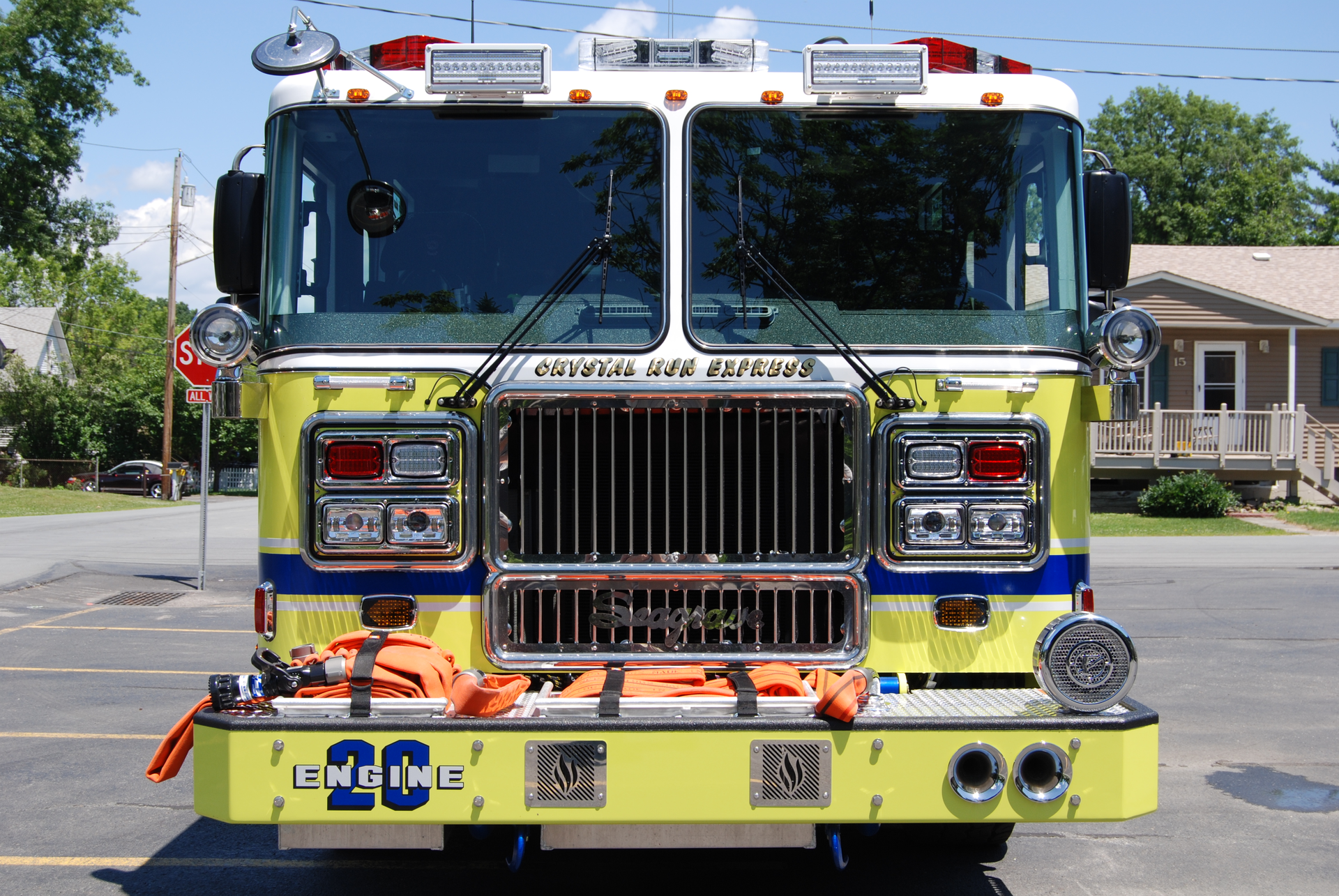 The steel bumper on this Seagrave pumper has a full reinforcement channel behind to protect the cab and crew. Note the location of the handrails just below the windshield.