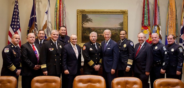 Representing the leadership within law enforcement, fire, EMS and emergency communications who fought to secure the D Block for the sole use of public safety: (From left to right) Charles Werner, Dick Mirgon, Chuck Dowd, Jeff Johnson, Chris Moore, Ray Kelly, Al Gillespie, Vice President Joe Biden, Walt McNeil, Harlin McEwen, Mick McHale and Tommy Nee. Photo taken on Feb. 21, 2012, just before Congress allocated the D Block to public safety.