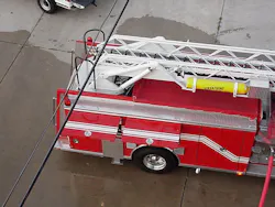 Photo 5: Spotting the aerial device to avoid hazardous conditions and maximum scrub capability are just a few skills apparatus operators can train on. Photo 5: Spotting the aerial device to avoid hazardous conditions and maximum scrub capability are just a few skills apparatus operators can train on.