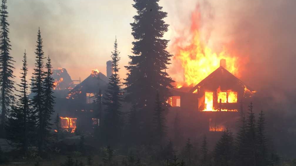 The Sperry Chalet Complex dormitory burns during the Sprague Fire in Montana's Glacier National Park on Aug. 31, 2017.