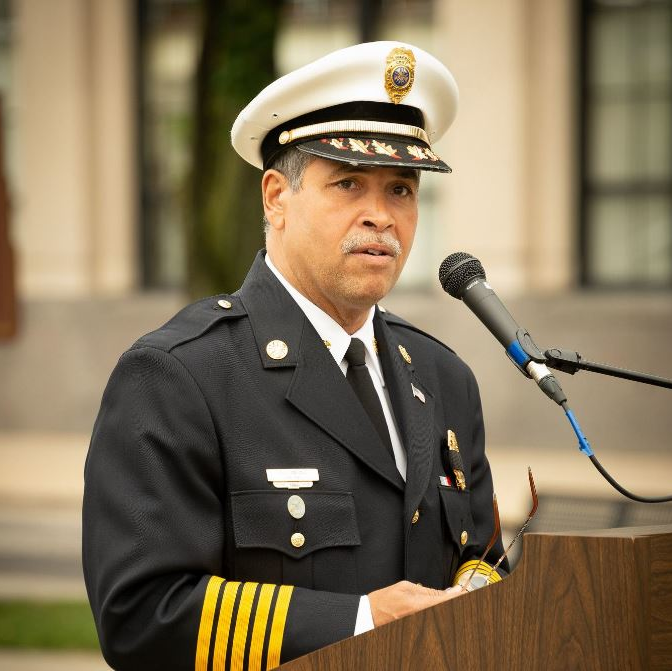 Toledo Fire & Rescue Chief Luis Santiago speaks during the department's 57th Annual Memorial Service to honor fallen firefighters on June 11, 2018, in Toledo, OH.