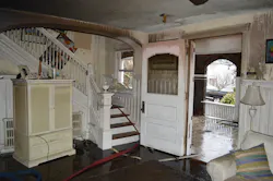 The stairwell leading to the second-floor hallway where Firefighter Funk's incident occurred, forcing him to dive down the stairs to exit. The stairwell leading to the second-floor hallway where Firefighter Funk's incident occurred, forcing him to dive down the stairs to exit.