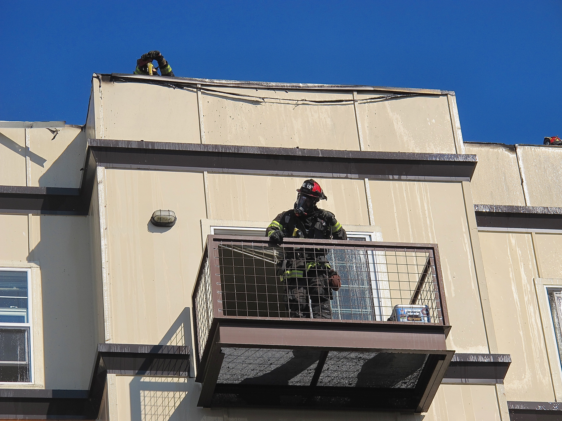 When operating on the floor above, note any windows, doors, balconies, fire escapes, air conditioners, window bars/gates, plywood over window/doors.