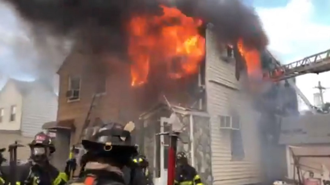 FDNY firefighters at the scene of a three-alarm fire at a home in Brooklyn on Monday, Sept. 24, 2018.