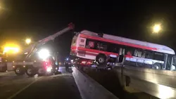 A bus can be seen dangling over a median gap on Interstate 95 after a wreck on Sunday, Sept. 9, 2018, in Jacksonville, FL. A bus can be seen dangling over a median gap on Interstate 95 after a wreck on Sunday, Sept. 9, 2018, in Jacksonville, FL.