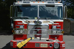 Arlington County, VA, Engine 103 operates this apparatus with a 19-inch bumper extension with a notched bumper for the front intake and raised hose tray for the trash line. Note the short handrails below the windshield and reinforced steel bumper. Arlington County, VA, Engine 103 operates this apparatus with a 19-inch bumper extension with a notched bumper for the front intake and raised hose tray for the trash line. Note the short handrails below the windshield and reinforced steel bumper.