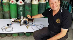 EasyTek President Stephen Burton with the Haskel oxygen boost pump used in the cave rescue. EasyTek President Stephen Burton with the Haskel oxygen boost pump used in the cave rescue.