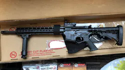 Prosecutors say Kansas City, MO, fire Capt. James Samuels sold this AR-15 .223-caliber rifle and ammunition to a confidential informant he believed was a convicted felon. Prosecutors say Kansas City, MO, fire Capt. James Samuels sold this AR-15 .223-caliber rifle and ammunition to a confidential informant he believed was a convicted felon.