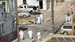 Police join members of the ATF and the FBI as they investigate a fiery car explosion that rocked an Allentown neighborhood on Saturday. Police join members of the ATF and the FBI as they investigate a fiery car explosion that rocked an Allentown neighborhood on Saturday.