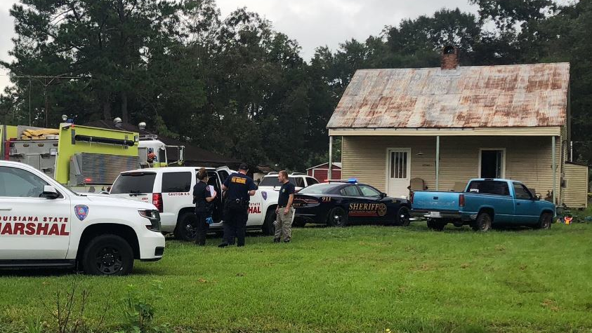 Louisiana state fire officials on scene after a fatal fire in the Baton Rouge area.