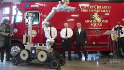 Orlando fire officials join Mayor Buddy Dyer, right, in unveiling a new bomb squad robot on Tuesday, Oct. 16, 2018. Orlando fire officials join Mayor Buddy Dyer, right, in unveiling a new bomb squad robot on Tuesday, Oct. 16, 2018.